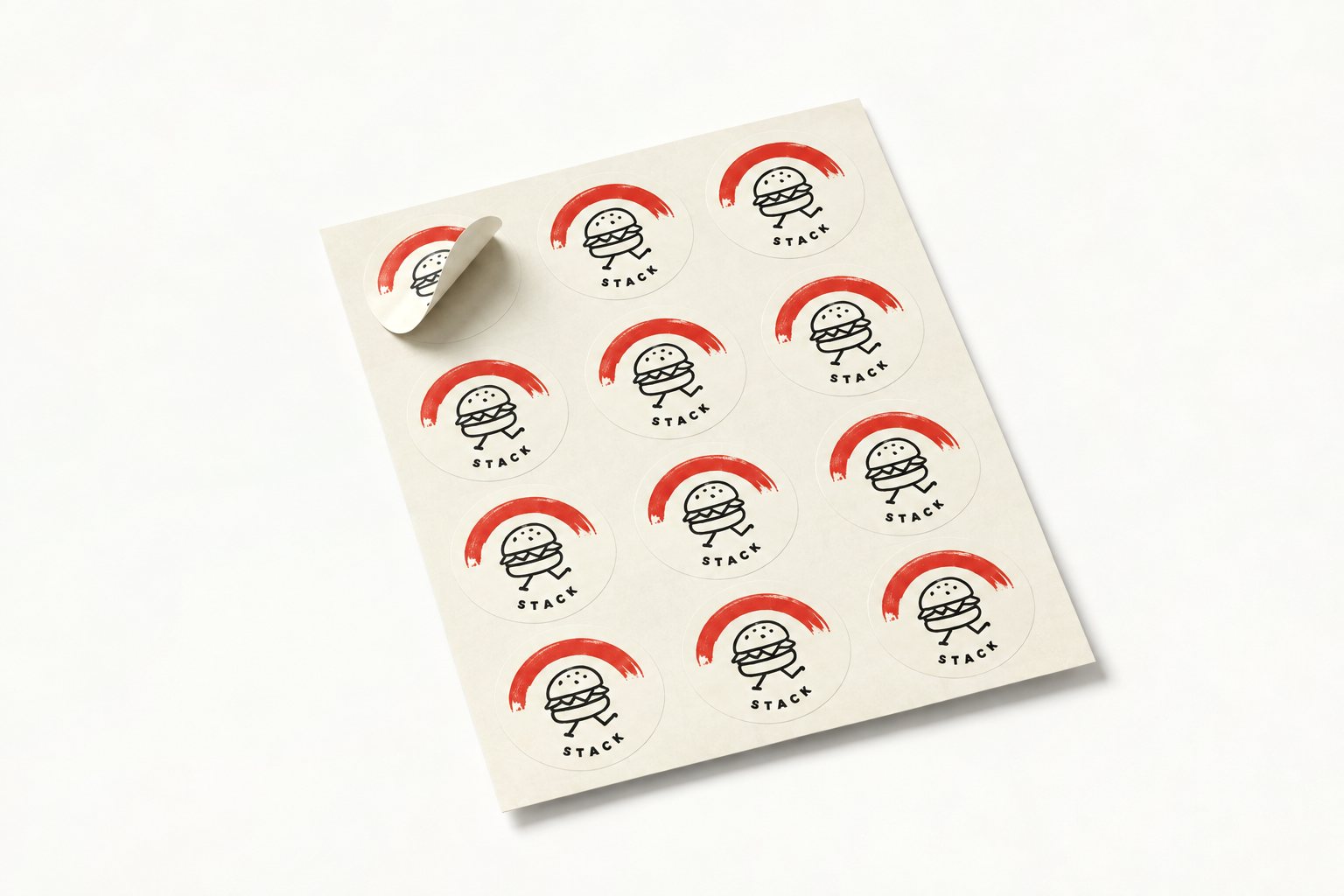 Sheet of 30 mm round stickers printed with the “STACK” burger logo